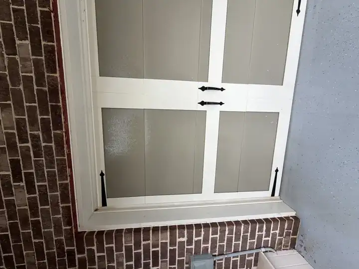 Staining on the garage door more or less completely removed after wash.